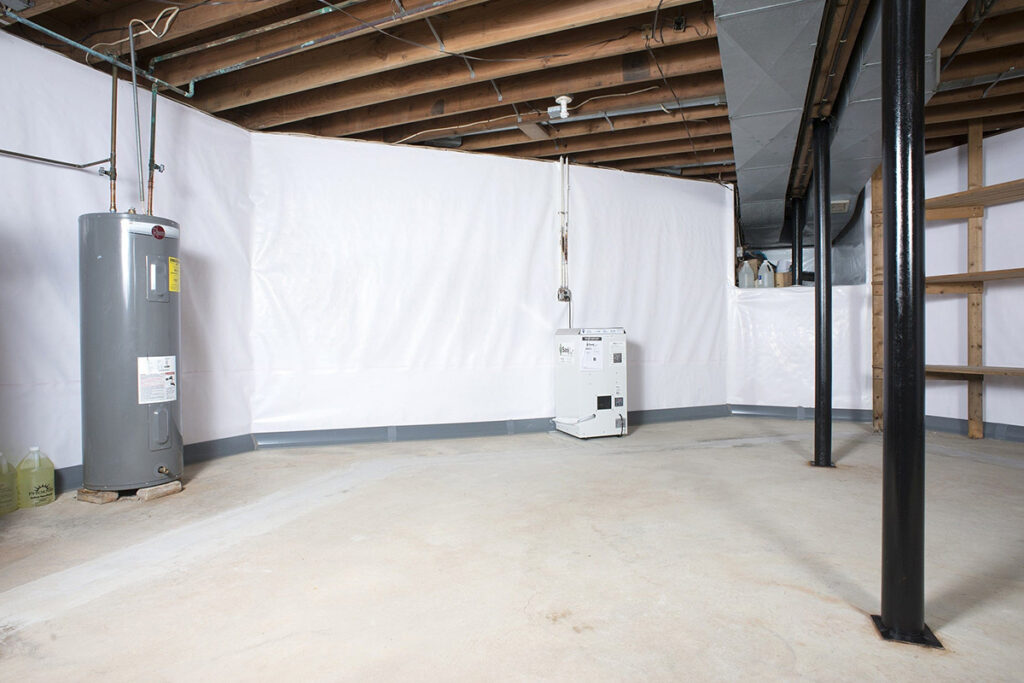 Basement waterproofing plastic sheeting, sump pump, and water heater in Northern VA.